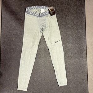 Nike pro dry fit men’s medium, with tag still on, gray